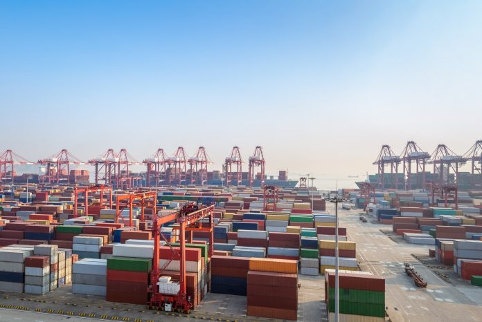 modern container terminal at dusk