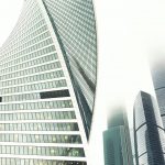 Glass facades of modern skyscrapers at business district