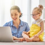 mother with toddler working