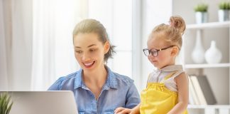 mother with toddler working