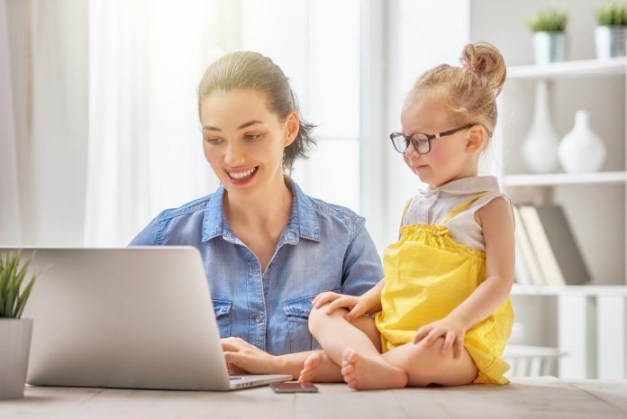 mother with toddler working